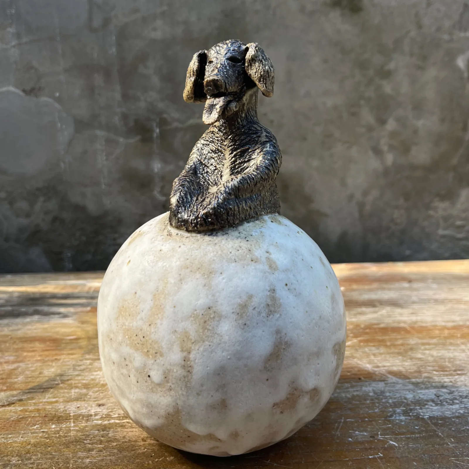 DOG ON THE MOON — Stoneware, 22cm x 12cm. Ceramic work by Dubravka Sabljak. View 1 of 4.