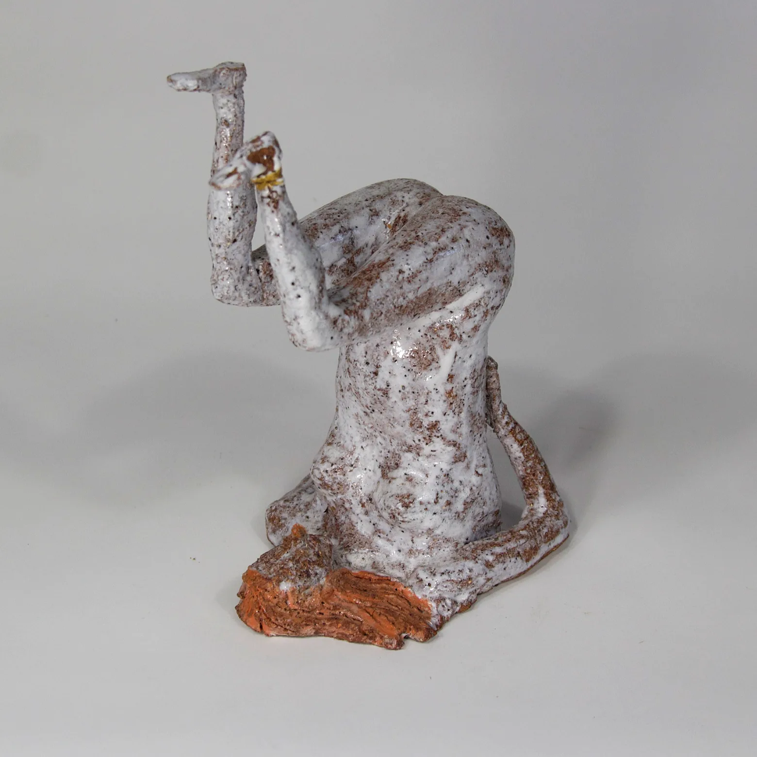 GIRL UPSIDE DOWN — Stoneware. Ceramic work by Dubravka Sabljak. View 1 of 3.
