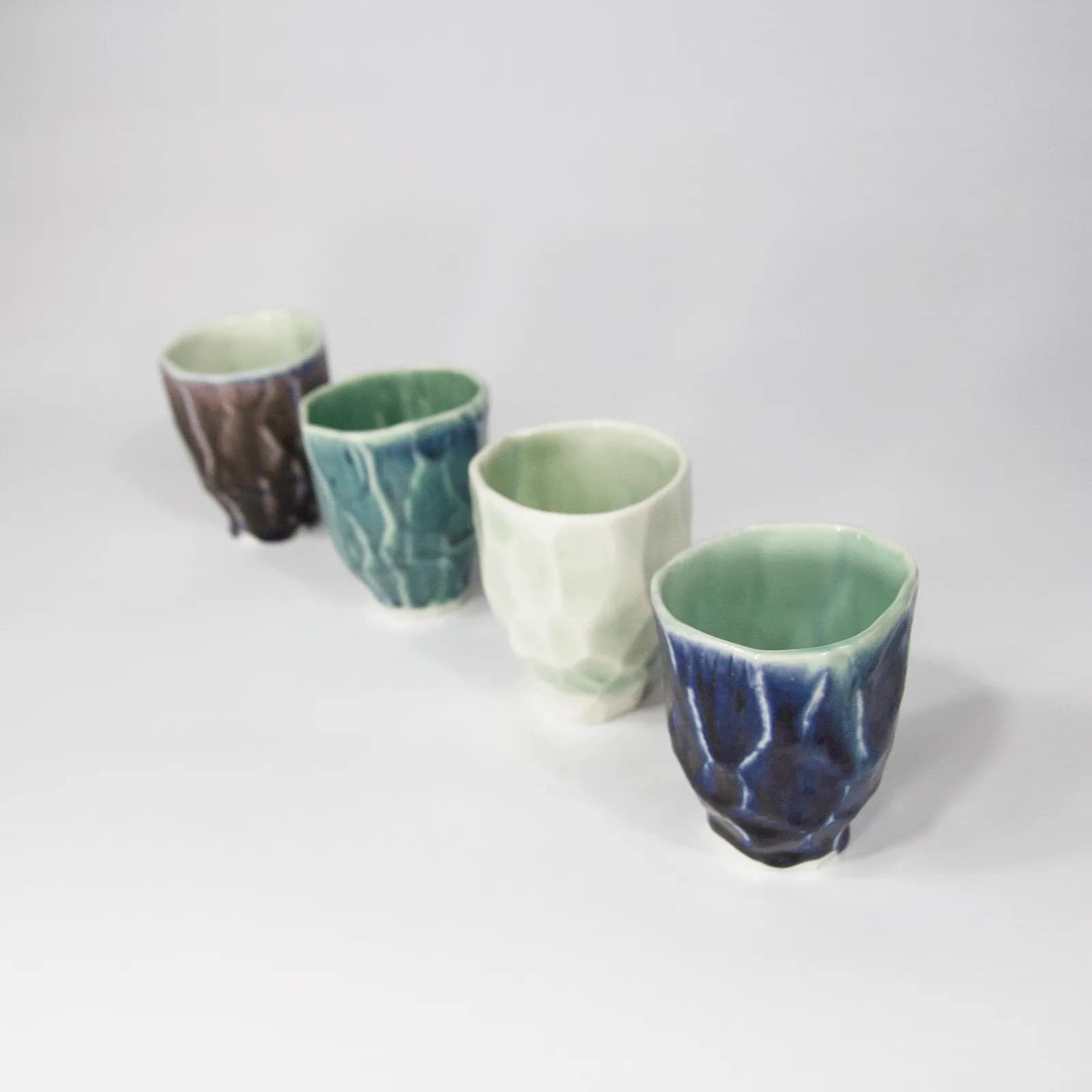 FACETED CUPS — PORCELAIN, 10cm x 5cm. Ceramic work by Dubravka Sabljak. View 1 of 3.